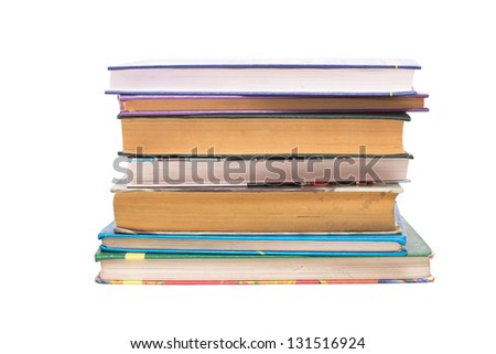 A stack of books of various sizes on a white background.