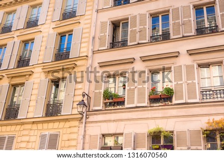 Paris, France. View on French Parisian apartments  and  flats with typcial balconies. Cityscape panorama near Notre Dame in Paris, France.