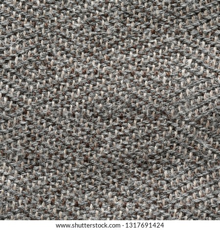 Abstract fabric texture, used as background. grey weave material