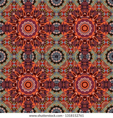 Bohemian style background in brown, red and magenta colors. Decorative floral embroidery seamless pattern, ornament for textile, kerchief, pillow or handbag decor.