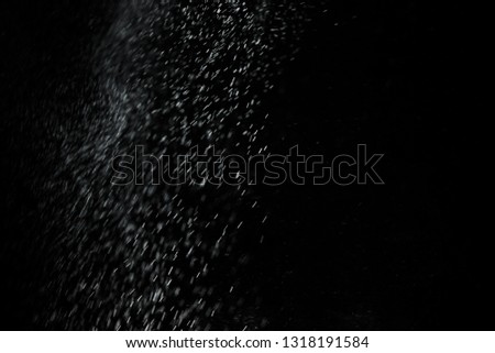 close up of steam smoke powder on black background 