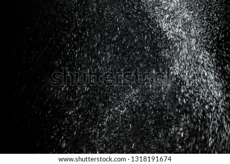 close up of steam smoke powder on black background 