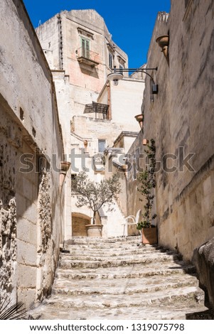 A little street in the town of Matera in Italy with historic buildings. Unesco heritage site