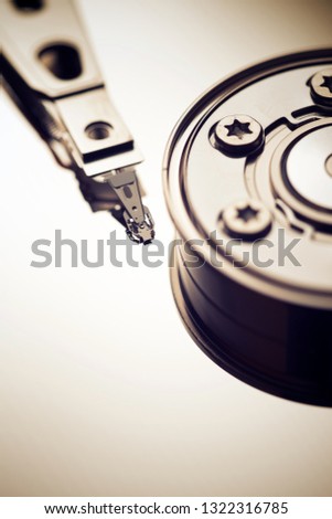Closeup of an open computer hard drive.