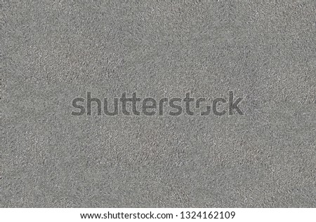 Black asphalt texture. Tarmac dark grey grainy road background. Top view grunge rough surface