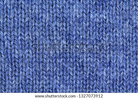 Knitted sweater, closeup neutral background