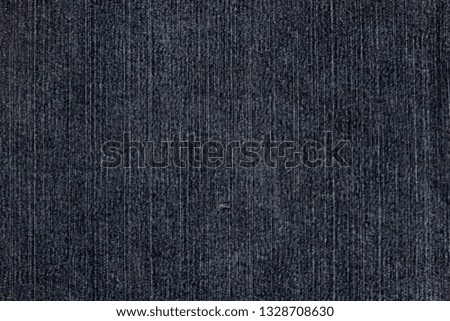 Texture of a black denim fabric