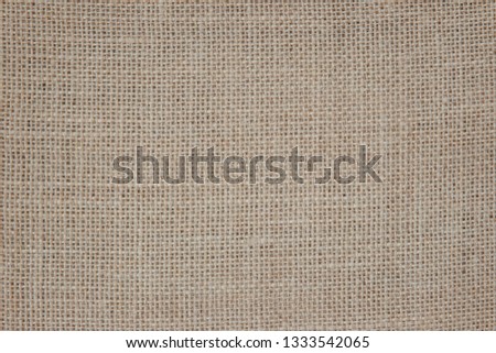 Vintage abstract Hessian or sackcloth fabric or hemp sack texture background. Wallpaper of artistic wale linen canvas. Blanket or Curtain of cotton pattern with copy space for text decoration. 