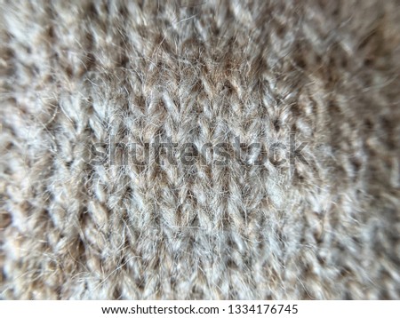 Texture of knitted sweater closeup