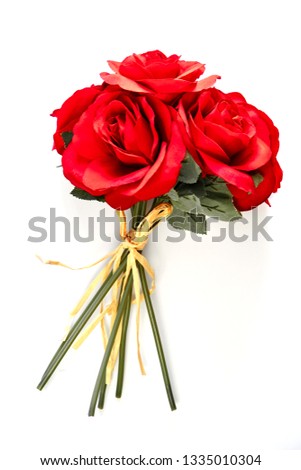 A studio photo of artificial flowers