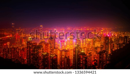 Famous view of Hong Kong - Hong Kong skyscrapers skyline cityscape view from Victoria Peak illuminated in the evening blue hour. Hong Kong, China