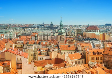 Red tiled roofs of a medieval old european city, Prague, Czech Republic. Aerial view 