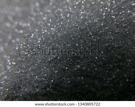 Silver glitter sparkling Christmas abstract background with shiny bokeh