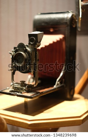 An Old Vintage Camera on a table top