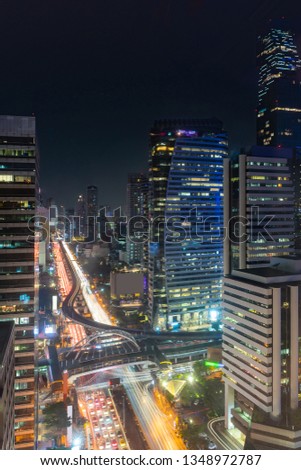 Bangkok in the night time long exposure at Sathorn in Bangkok, Thailand.