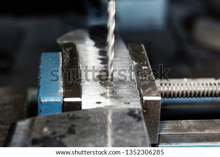 Drilling holes in a metal knife handle