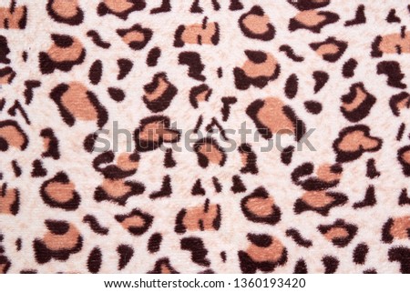 Leopard leather pattern texture closeup background realistic color textile