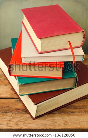 Bunch of books on wooden table