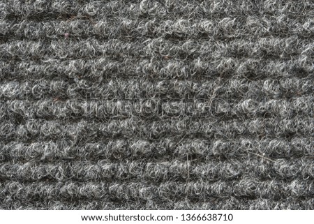 Texture of the Gray Nylon Carpet. Textile Background with Copy Space