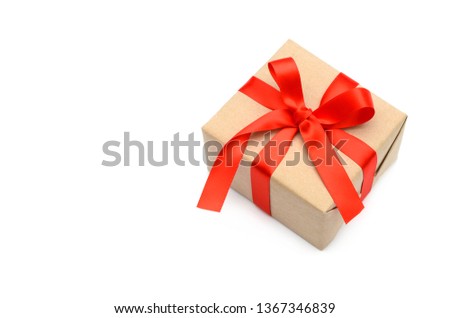 Gift box with red knot ribbon isolated on white background