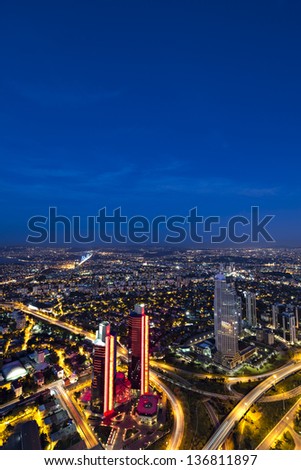 Skyscrapers, Bosphorus and bridge at night, Istanbul, Turkey