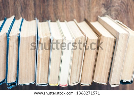 Stack of old book education concept background, many books piles with copy space for text