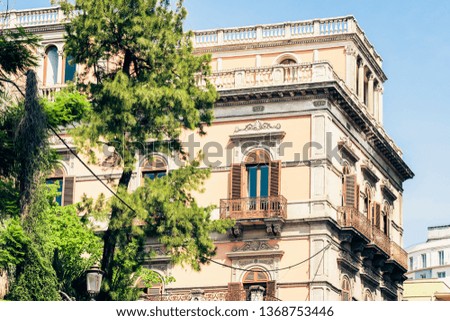 balcony in old baroque building in Catania, traditional architecture of Sicily, Italy