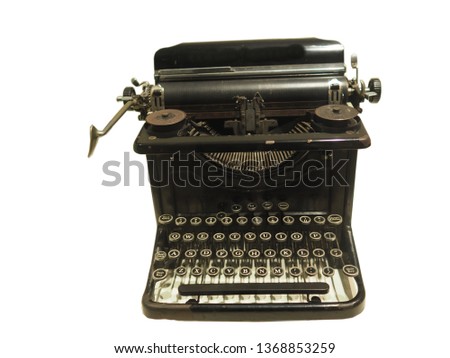 old portable typewriter in white isolated