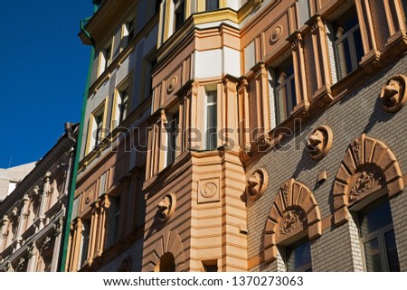 Fragment of the facade of a residential building on a city street
