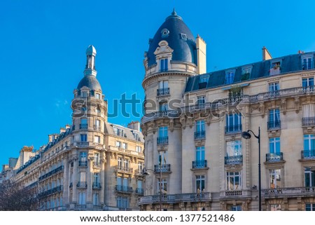 Paris, beautiful building in a chic area, typical parisian facade
