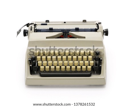 70s portable typewriter isolated on white background, contains clipping path.