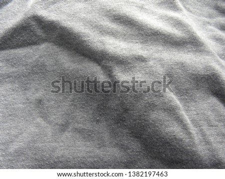 Gray cotton fabric with wrinkles