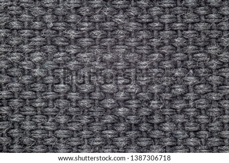 Extreme macro shot of a textile fabric showing the structure of the material.