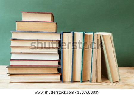 many books,. Stack of old books on book shelf. Education and library concept
