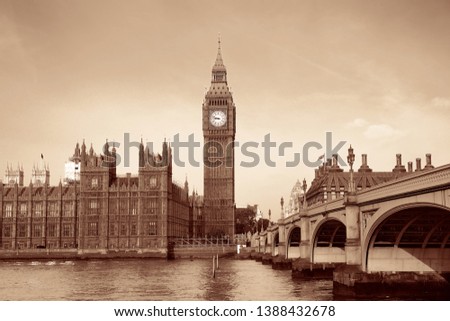 Big Ben and House of Parliament in London panorama over Thames River.