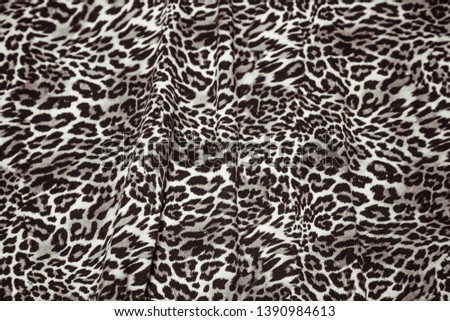 Leopard effect fabric pattern background sample Leopard print seamless background.