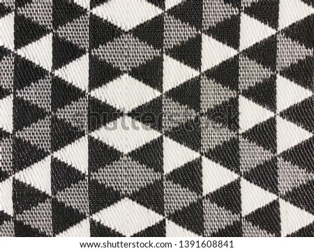 Close up black and white plastic weave mat texture background