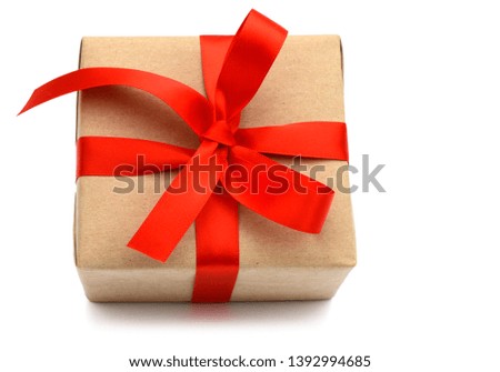 A single wrapped gift box with recycled paper and red ribbon, front view