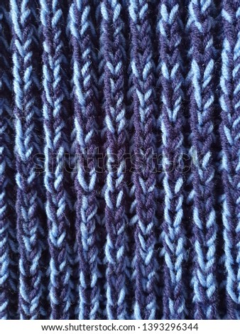 Texture, knitted on the knitting needle pattern from multi-colored threads