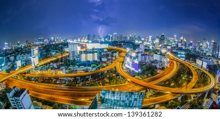 Bangkok city night view with main traffic high way.