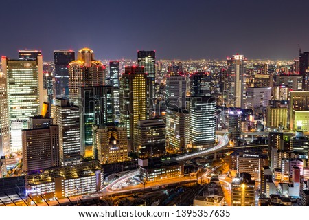 Osaka downtown skyline from Umeda sky building at night, Japan