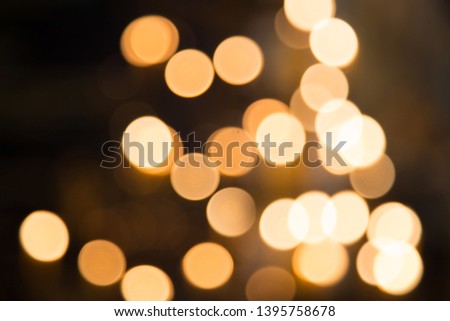 Blurred bokeh abstract background lights. Bokeh from candle light.