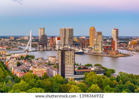 Sunset aerial view of Erasmus bridge and skyline of Rotterdam, Netherlands