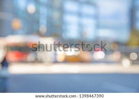 BLURRED COLORFUL CITY LIGHTS IN MODERN STREET BACKGROUND