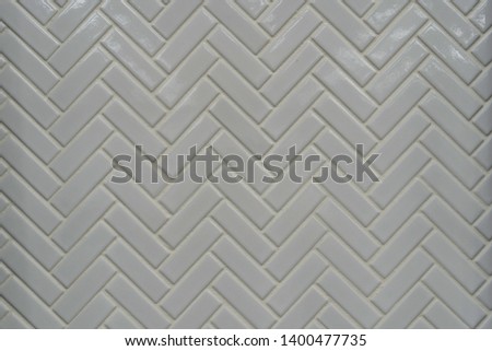 Stacked pattern in white tiles
