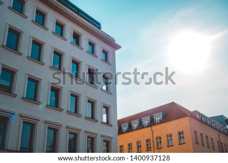 apartment houses with big sunlight on the side