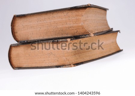 Two old books on white. Old publication. White isolated background