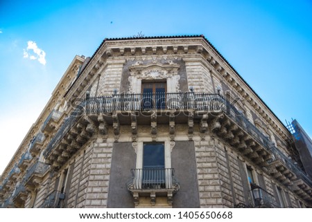 Catania historical baroque ornament in facade, balcony and windows