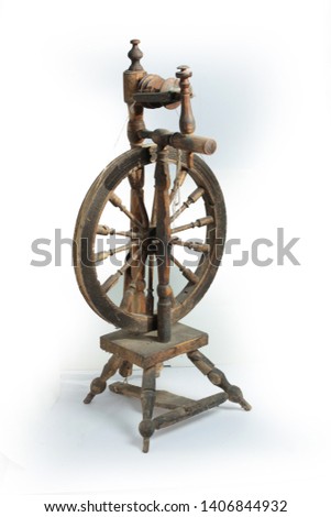 old Russian wooden spinning wheel