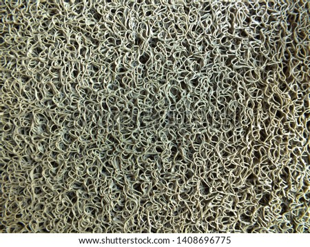The surface of Grey car mat.( Close-up. soft and Selective focus)